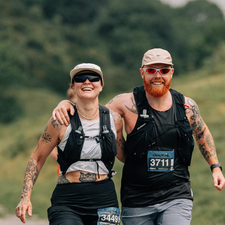 Runners arm in arm in Dorset