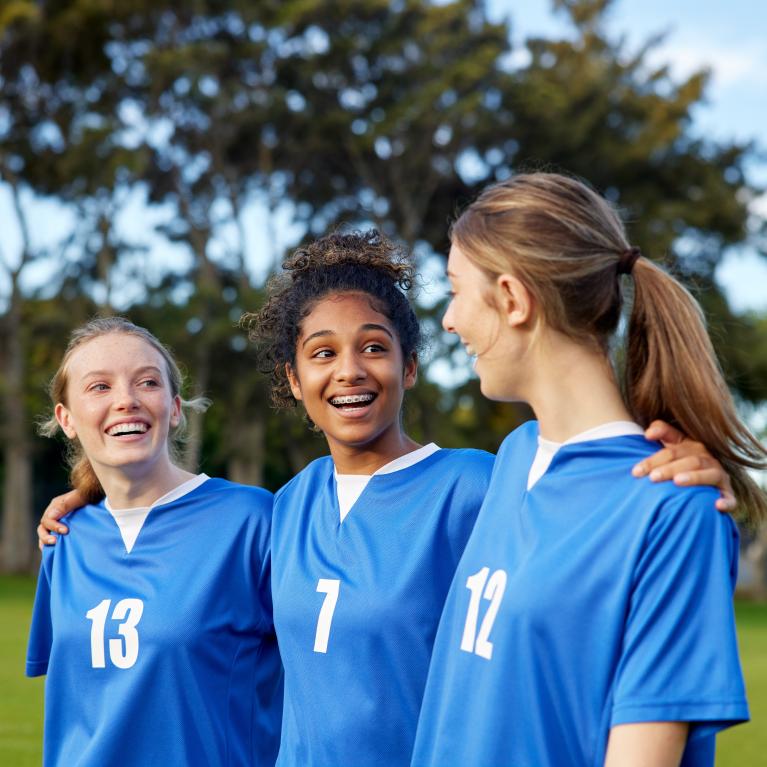 students on a football pitch