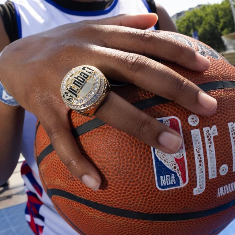 Player shows off their Jr. NBA 3v3 ring