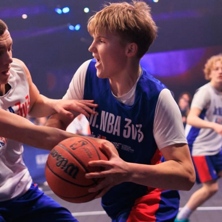 Players try to defend the ball