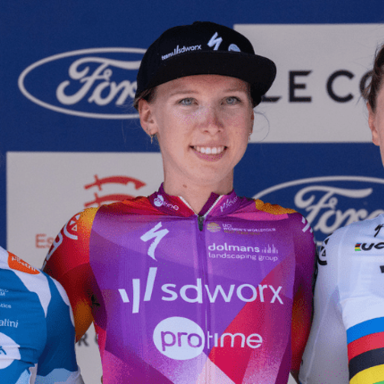 Lorena Wiebes (NED) of Team SD Worx Protime (NED), winner of Stage Two, celebrates on the podium alongside second place Charlotte Kool (NED) of Team dsm–firmenich PostNL (NED) and third placed Lotte Kopecky (BEL) of Team SD Worx Protime (NED) following Stage Two of the Ford RideLondon Classique on Saturday 25th May 2024