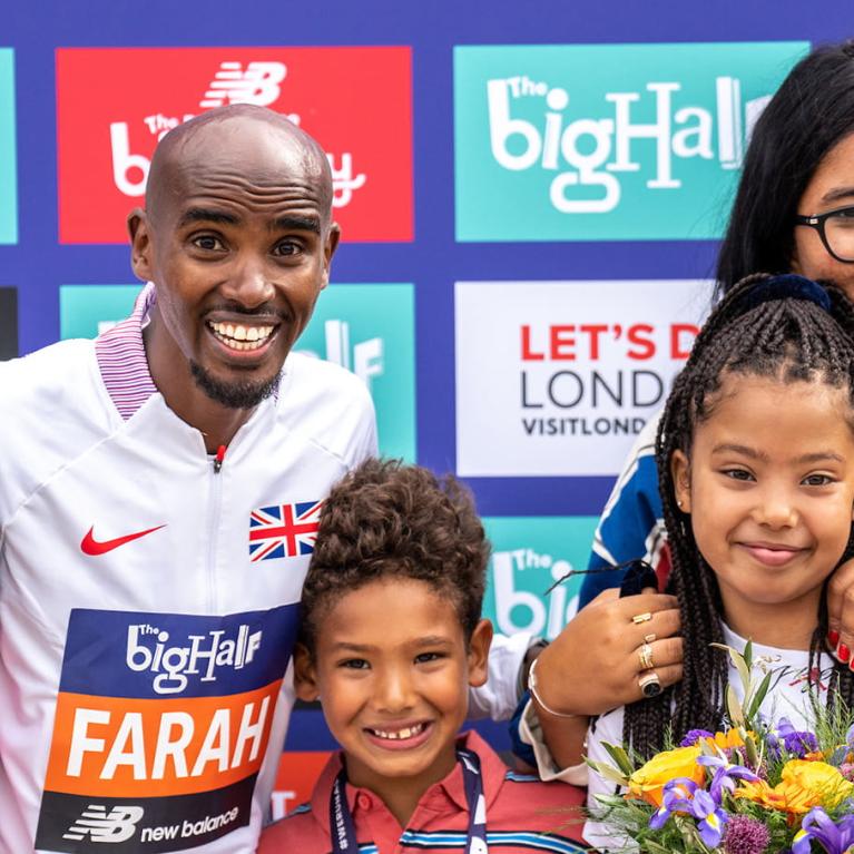 Mo Farah with his wife and children at end of The Big Half 2022