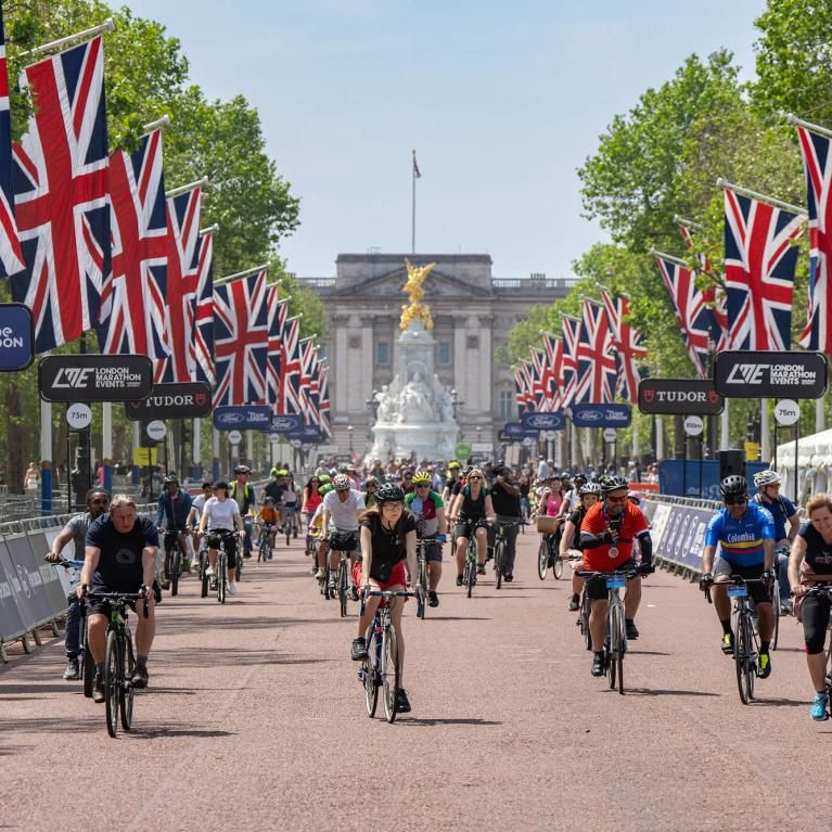 Cyclists on The Mall with Buckingham Palace in background