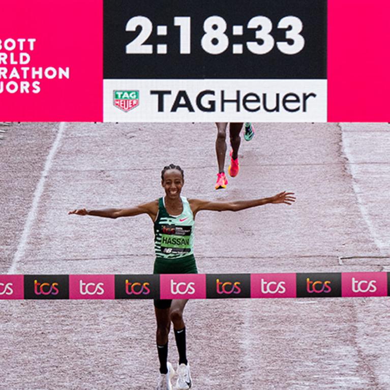 Sifan Hassan celebrates as she crosses the finish line