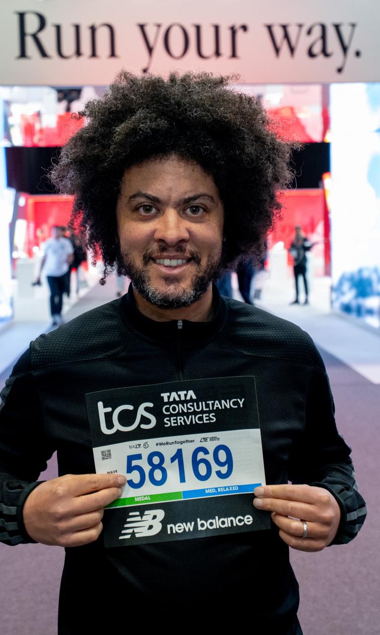 Participant picking up their running number