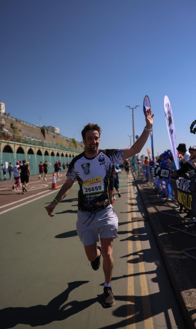 WWF runner by the charity cheer point