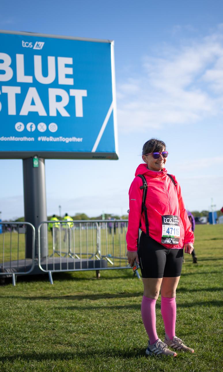 Participant standing proudly in the Blue Start area 