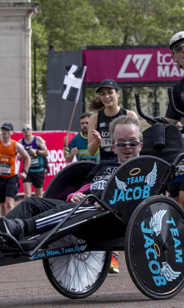 Assisted Wheelchair participants close in on the Finish Line