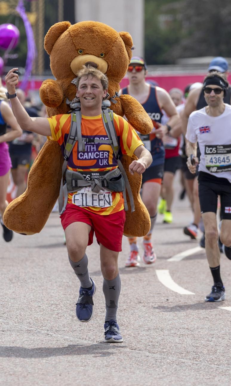 Children with Cancer runner with a giant bear on their back