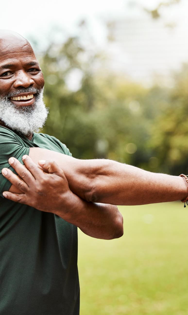 Runner stretching in the park