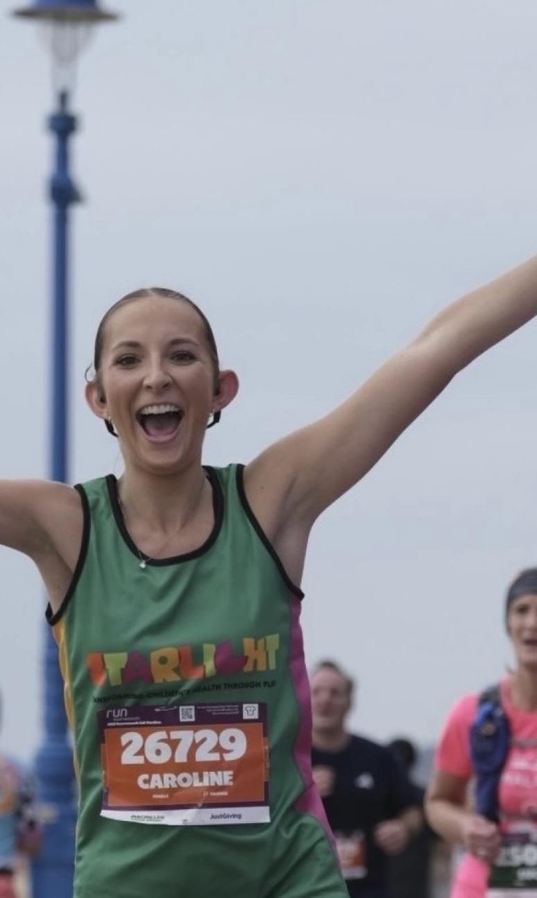 Caroline taking part in a running event 
