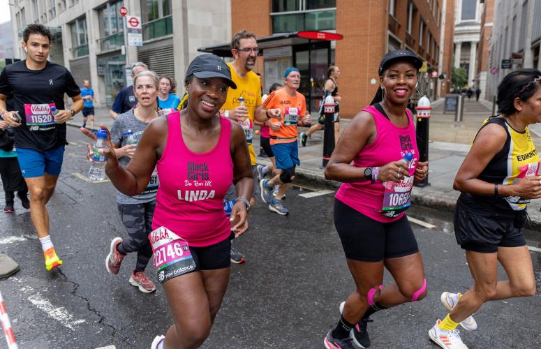 Participants run through the City of London during The Vitality London 10,000, Sunday 22nd September 2024.