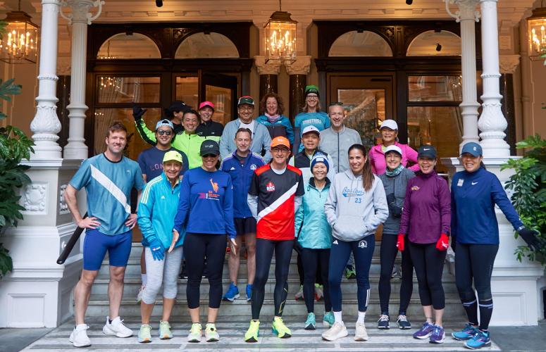 Marathon Tours & Travel runners pose for a group shoot