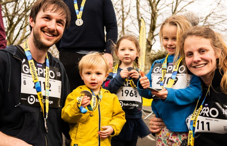 A large group with their medals