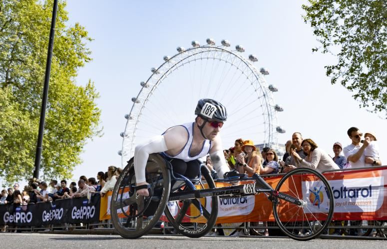 Wheelchair participant with the London Eye in the background