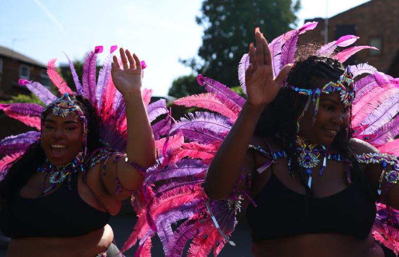 Dancers come out to support the runners