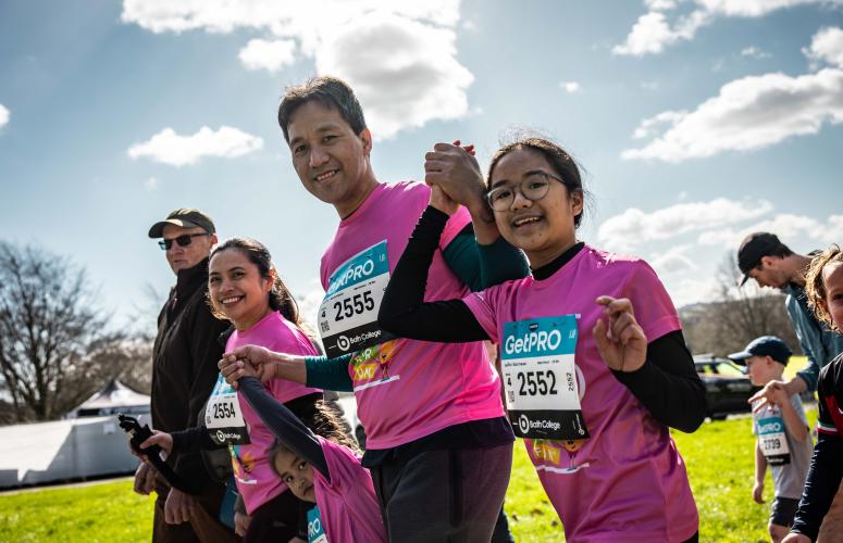 Family pose for the camera