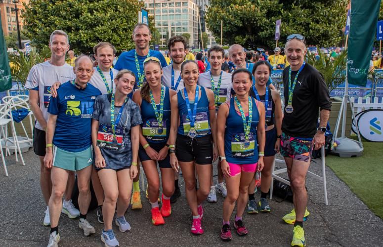 Finishers pose with their medals