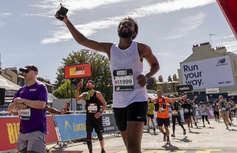 Participants celebrate on the final stretch of the course