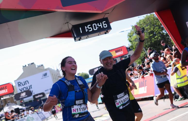 Big Half participants cross the finish line