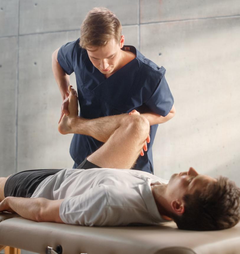 Man being treated by an osteopath