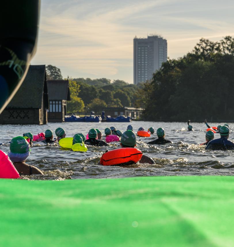 Swim participants entering the water