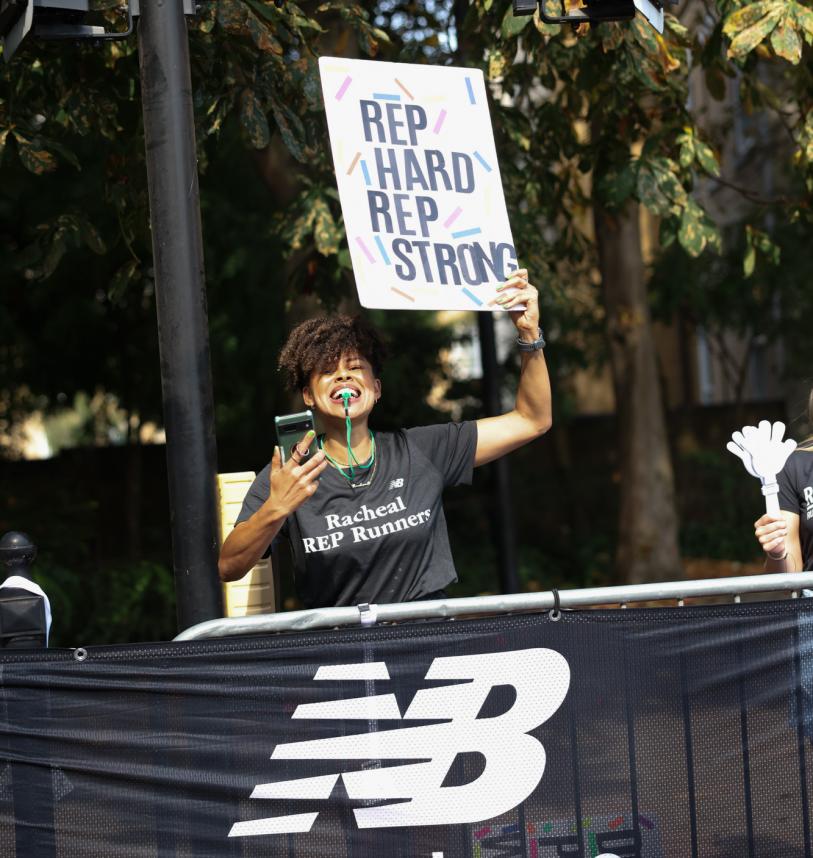 RED runners supporter holding up a banner