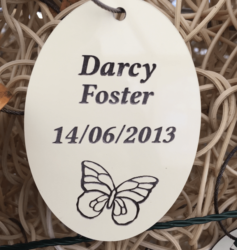 Darcy's name tag at the memorial garden