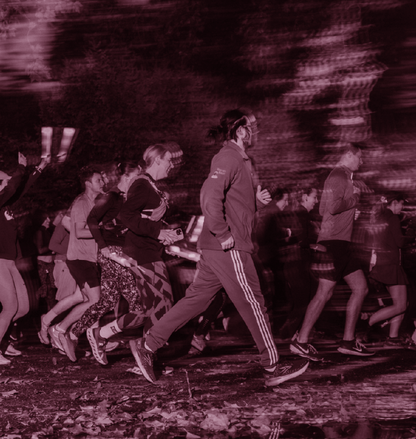 Side shot of runners taking part in an event 