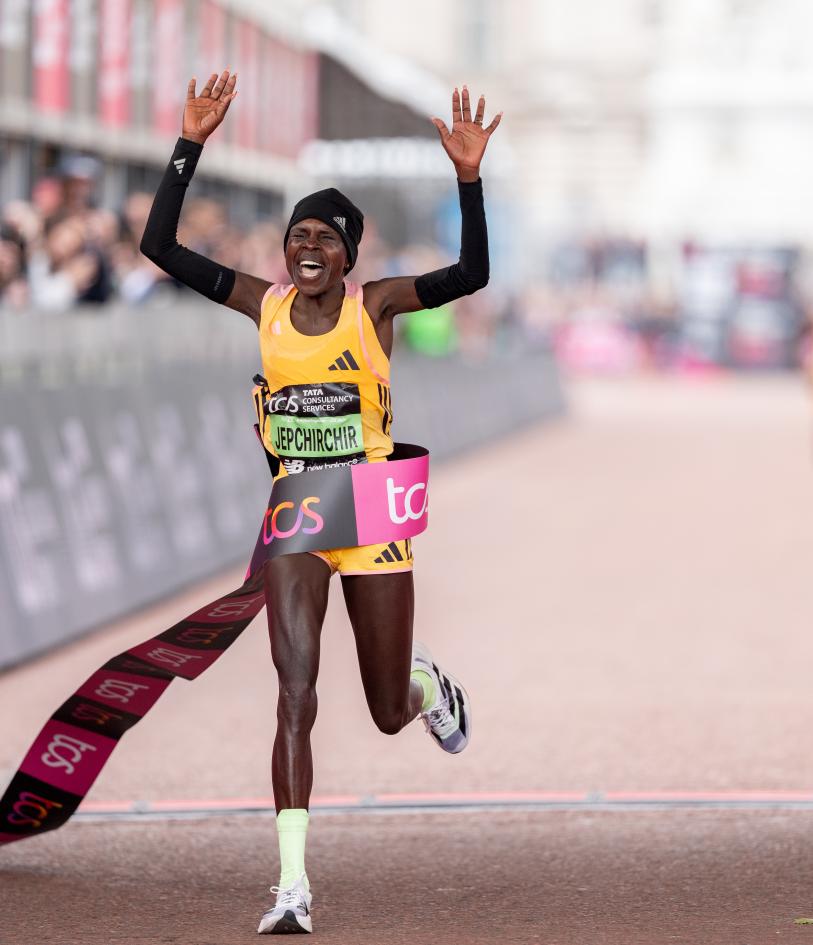 Peres Jepchirchir celebrates as she crosses the finish line on The Mall
