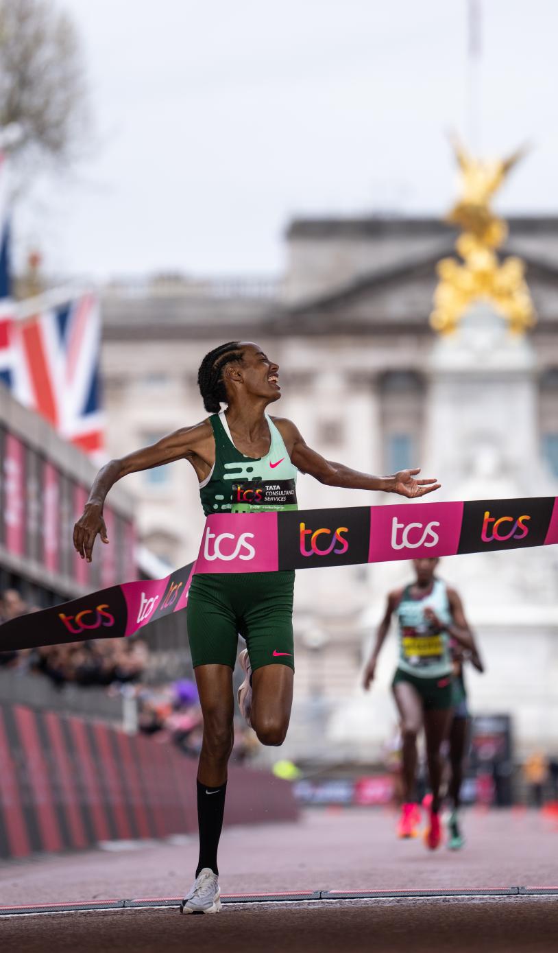 Sifan Hassan crosses the line on The Mall