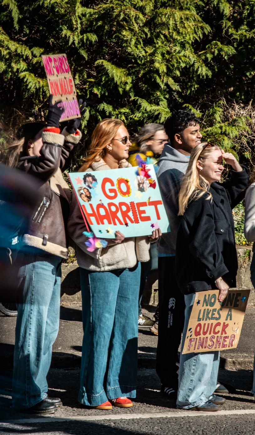 Supporters cheering on their runners