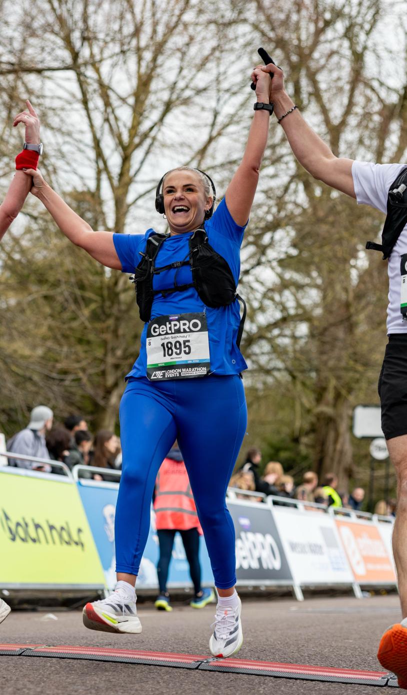 Finishers cross the GetPRO Bath Half Finish Line