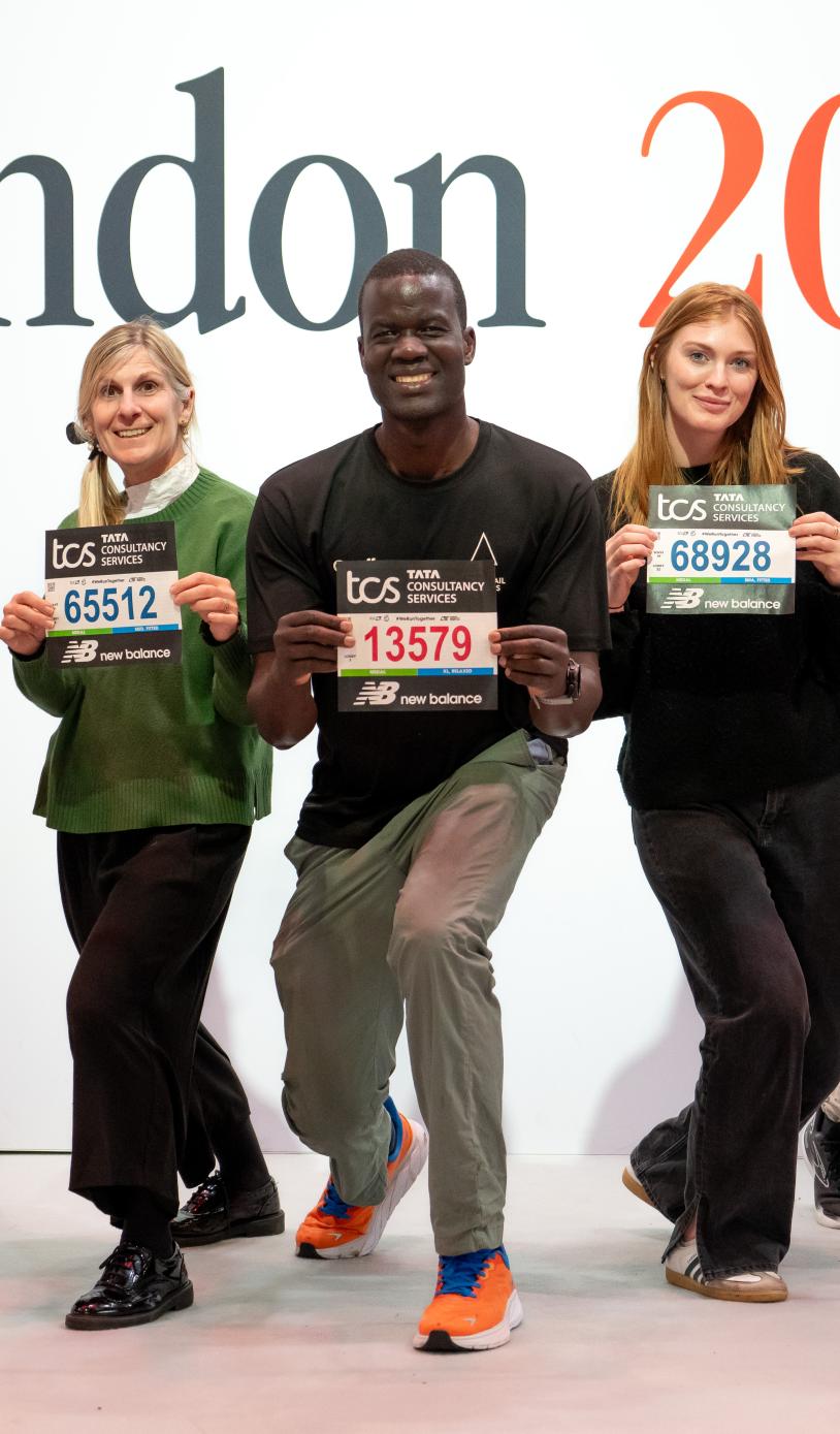 Participants pose with their bibs