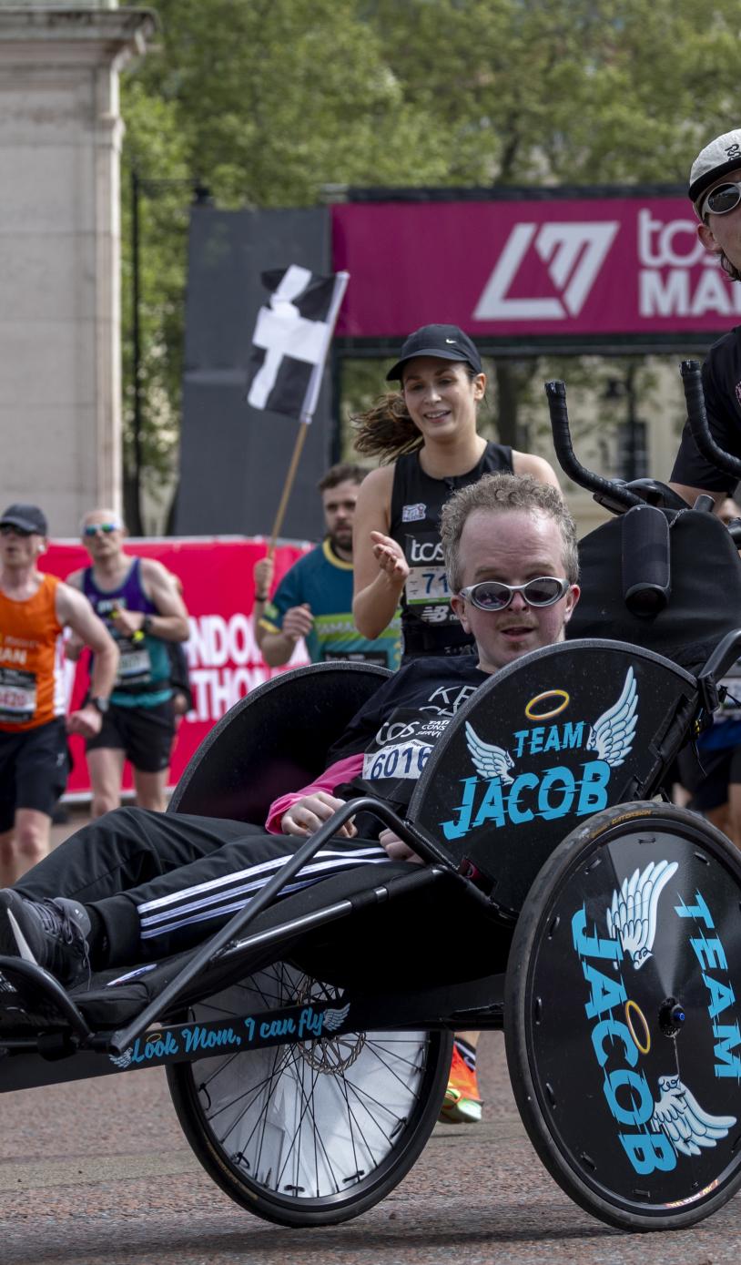 Assisted Wheelchair participants close in on the Finish Line