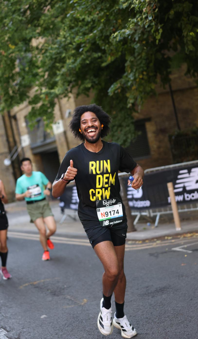 Run Dem Crew runner gives the photographer a thumbs up