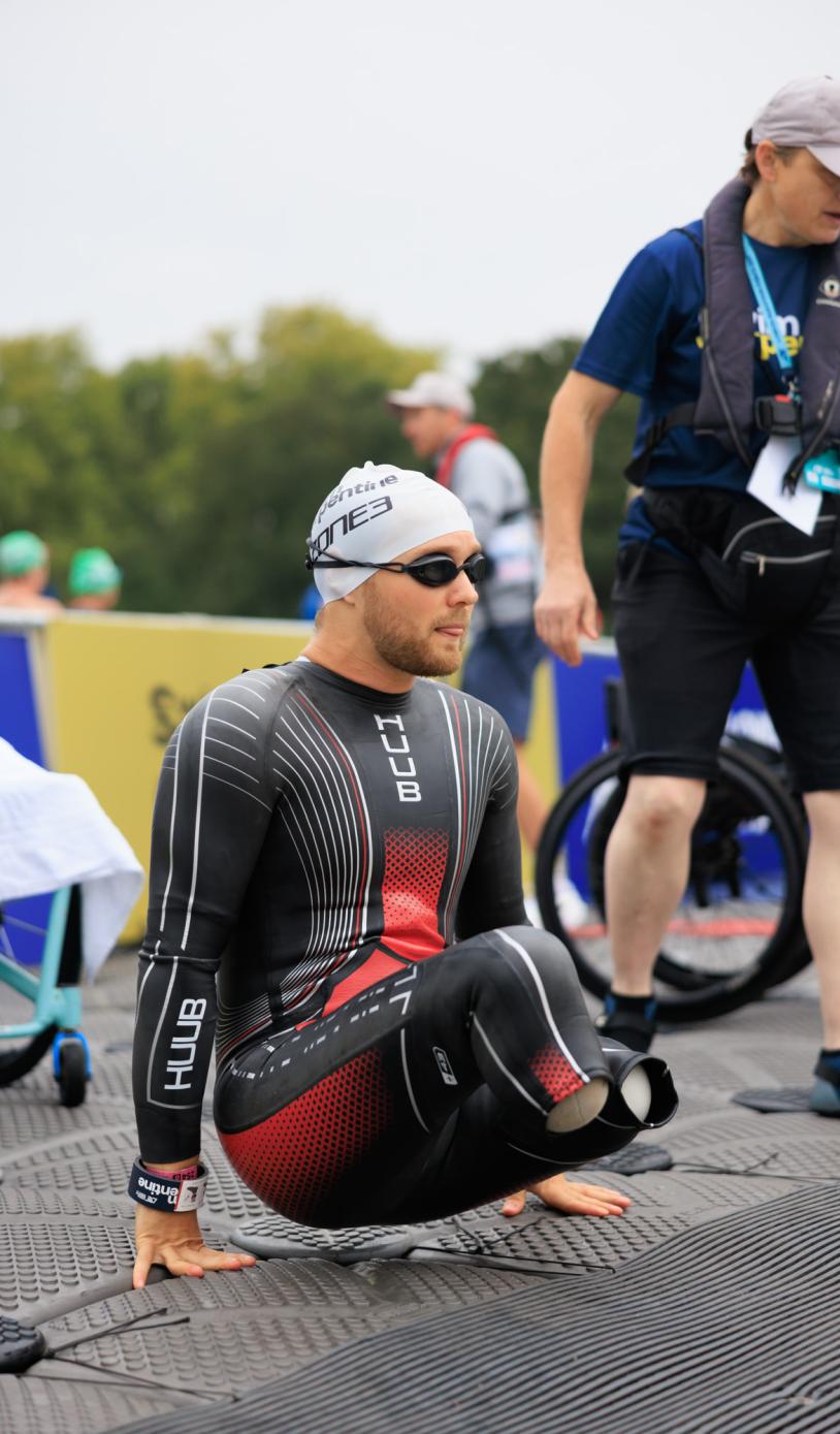 Swimmer enters the water