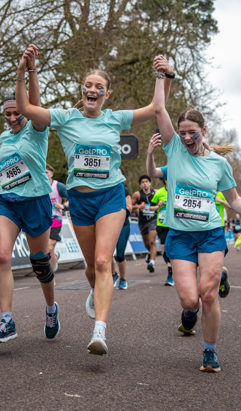 Runners celebrate at the 2027 GetPRO Bath Half