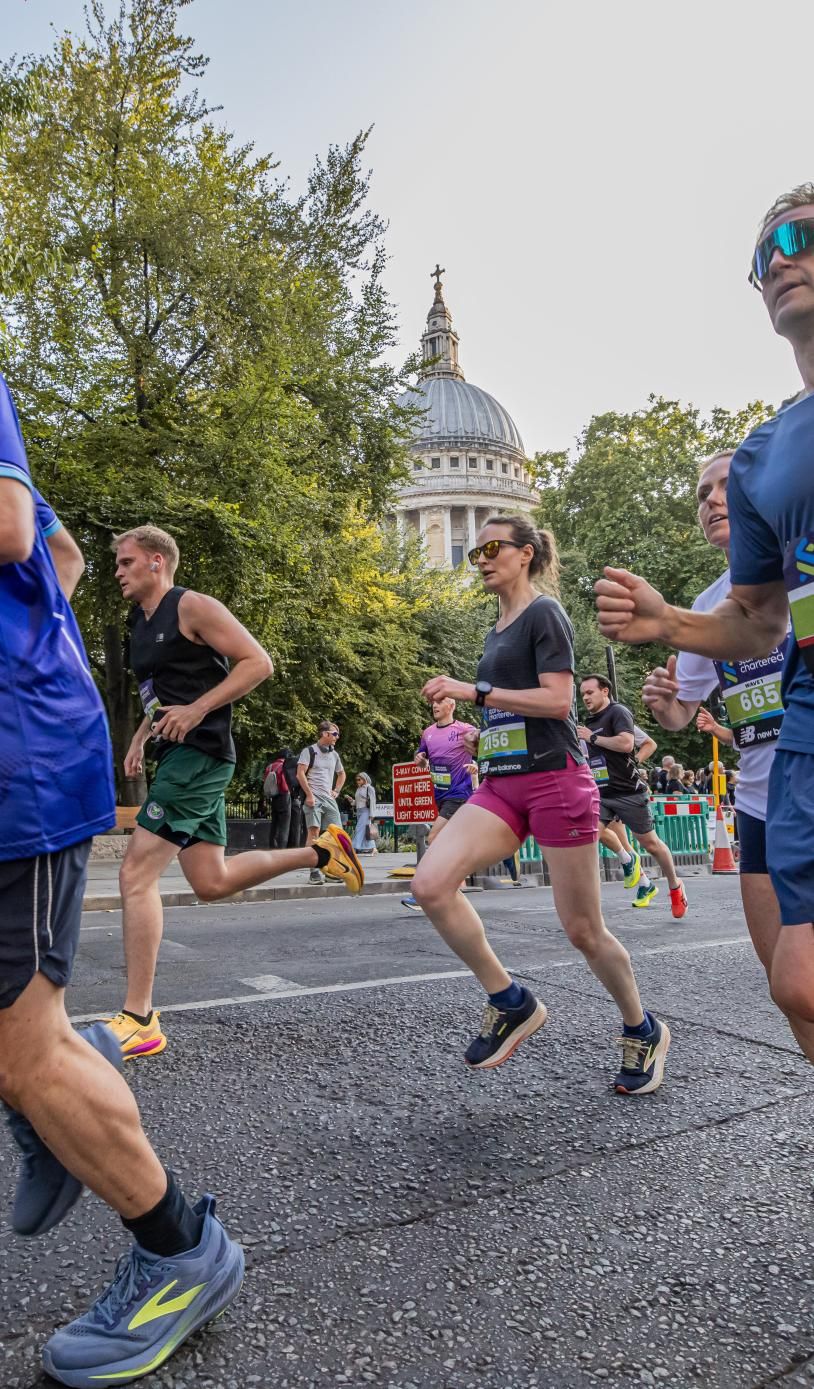 Runners pass St Pauls on the City Race course 