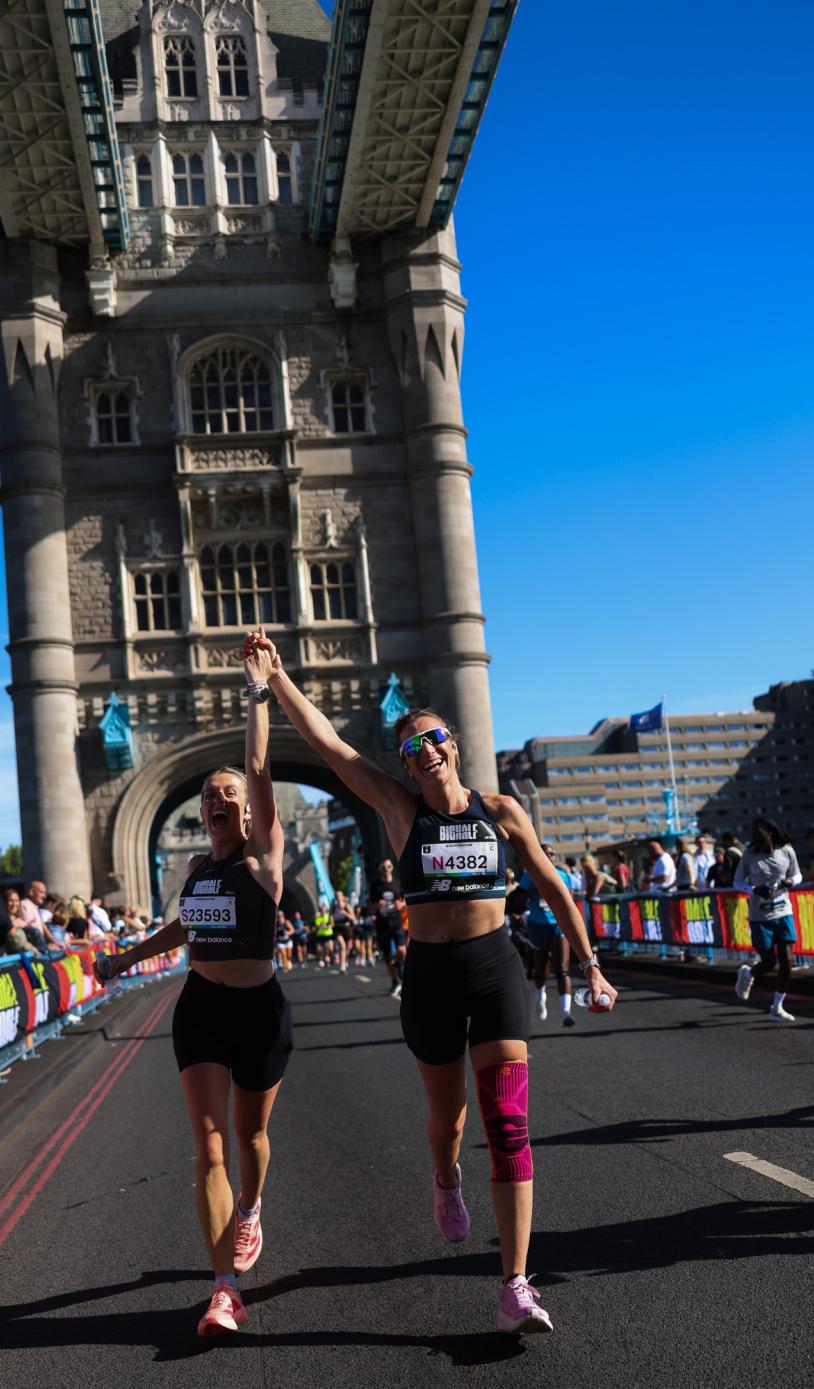 Two Big Half participants cross Tower Bridge