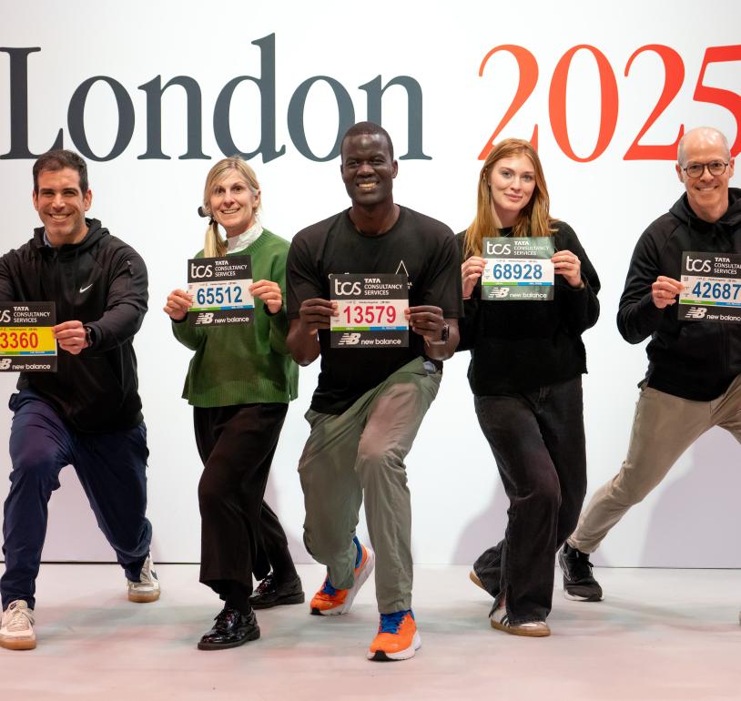 Participants pose with their bibs
