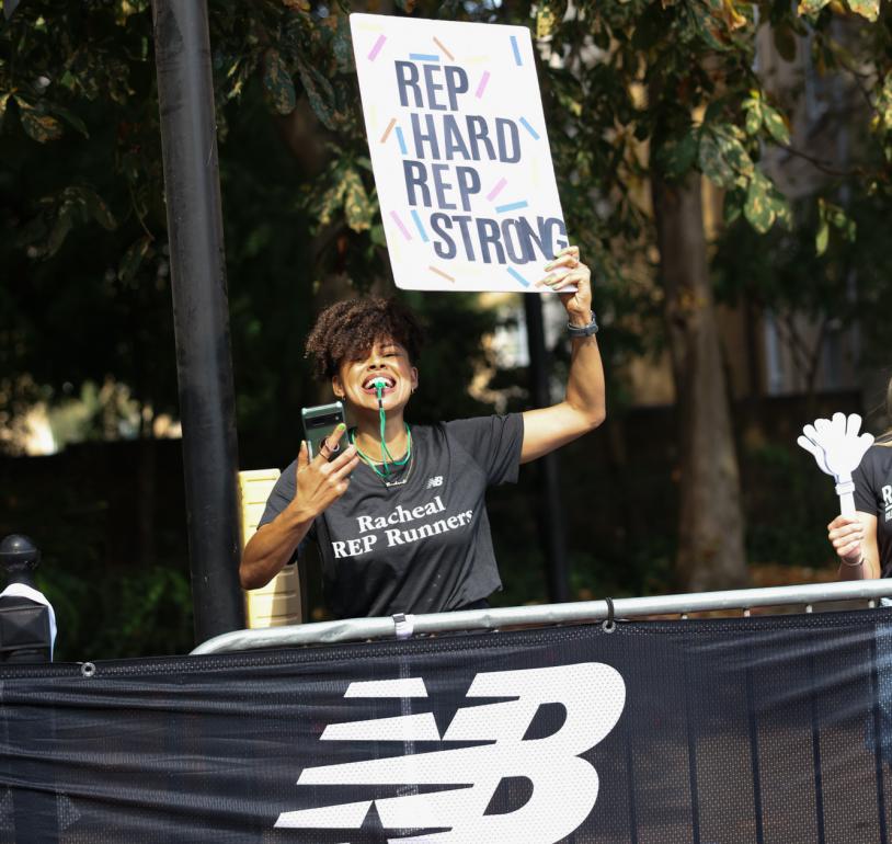 RED runners supporter holding up a banner