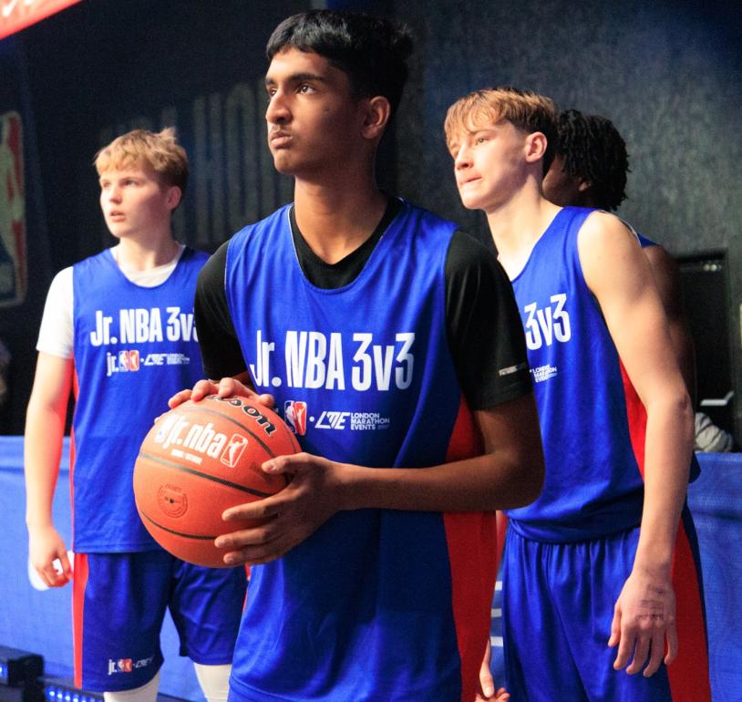 Jr. NBA 3v3 players prepare for a match 
