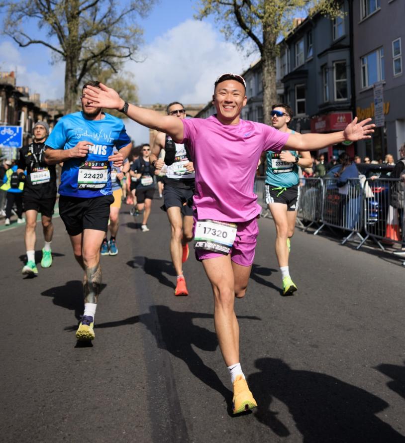 Runner poses for the camera on the Brighton course